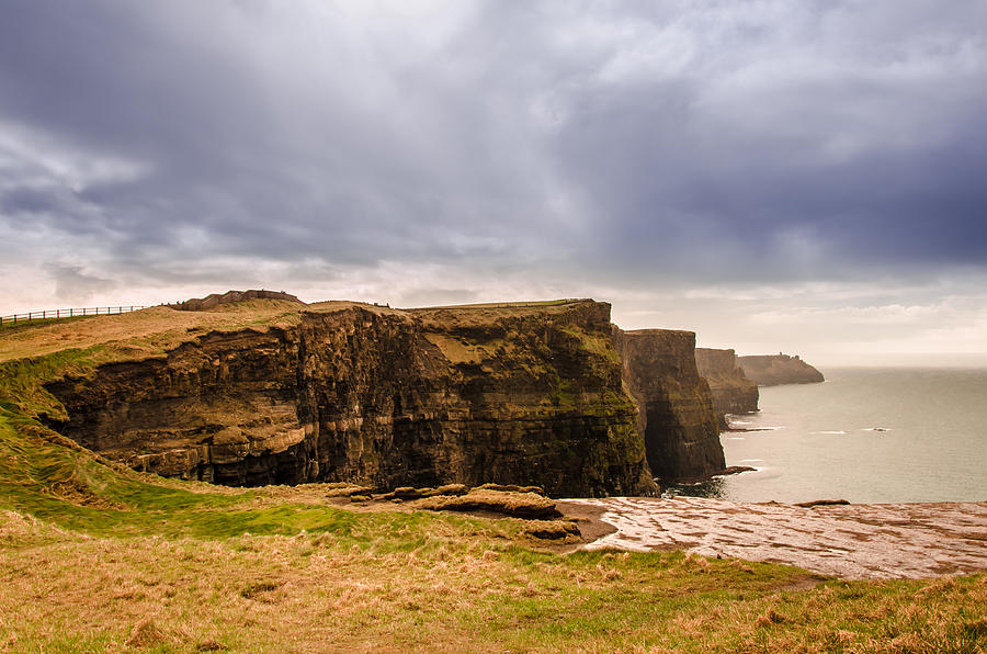 Nature Photograph - Cliffs Of Moher Under a Cloudy Sky by AMB Fine Art Photography