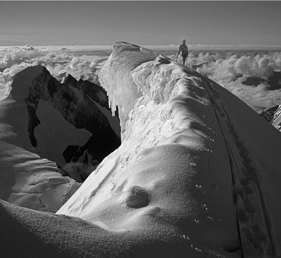 T-702411-BW-Climber on 12000 ft Cornice of Mt. Robson Photograph by Ed  Cooper Photography