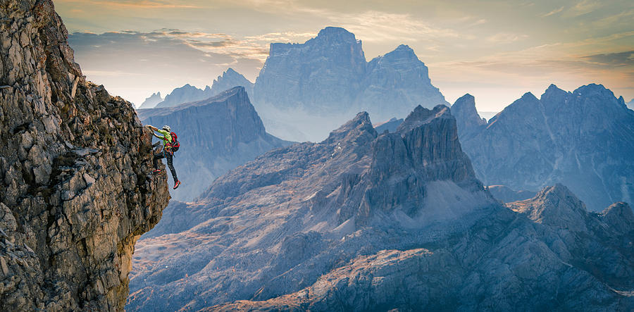 Climber on rocky wall, Dolomites, Cortina dAmpezzo, Veneto, Italy Photograph by Lost Horizon Images