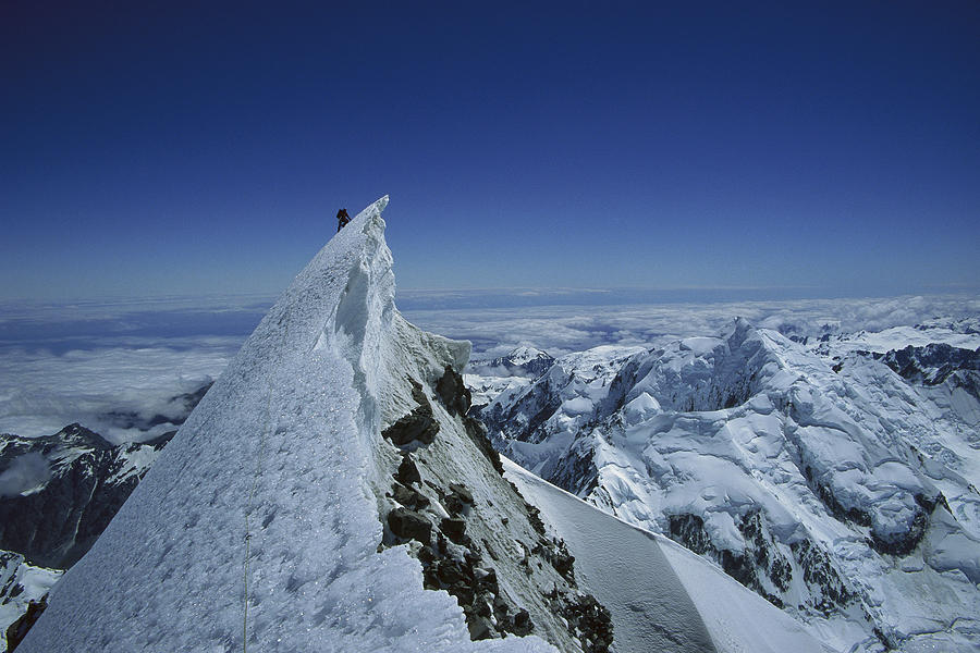 Climber On Summit Of Mount Cook Photograph by Ned Norton