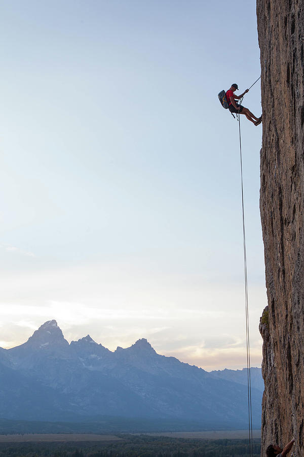 Climber Rappelling Down Boulder Photograph by Ben Horton