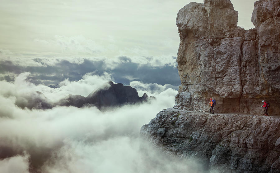 Climbers On A Trail In A Rocky Wall Photograph by Buena Vista Images