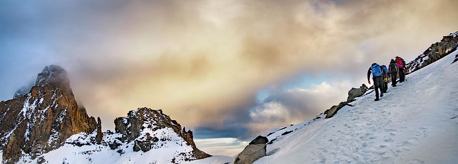 Sunset Photograph - Climbers Struggle Up Steep Snow by Jake Norton
