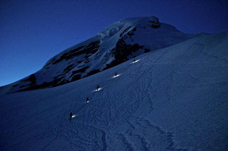 Nature Photograph - Climbers Wearing Headlamps Climb Mount by Marc Pagani