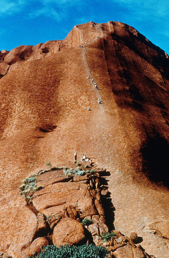 Climbing Ayers Rock Photograph by Brian Brake