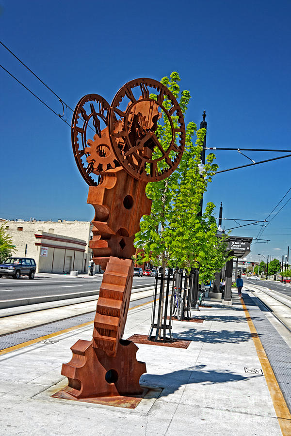 Clock Sculpture at Transit Stop Photograph by Charline Xia