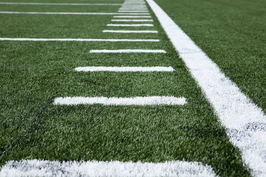 Close up football stadium artificial grass and markings Photograph by Carterdayne