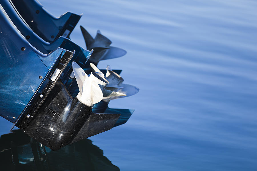 Close-up of a boats outboard motor and propellers Photograph by Gaspr13