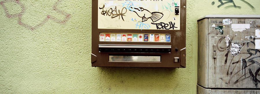 Color Image Photograph - Close-up Of A Cigarette Vending by Panoramic Images