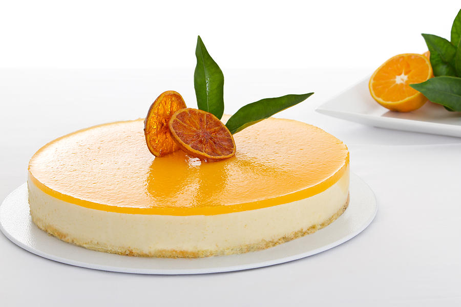 Close-up of a delicious orange cheesecake Photograph by Ruizluquepaz