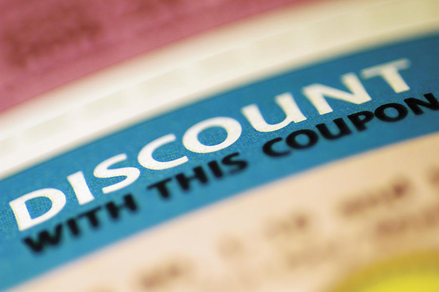 Close-up of a discount coupon Photograph by Medioimages/Photodisc