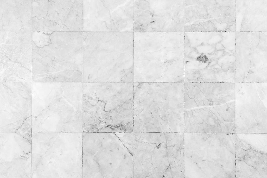Close-up of a smooth marble floor viewed from above in black&white. Photograph by Tuomas Lehtinen