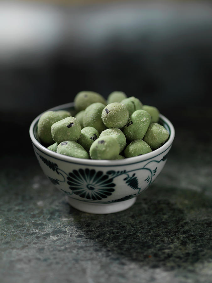 Close Up Of Bowl Of Wasabi Peas Photograph by Diana Miller