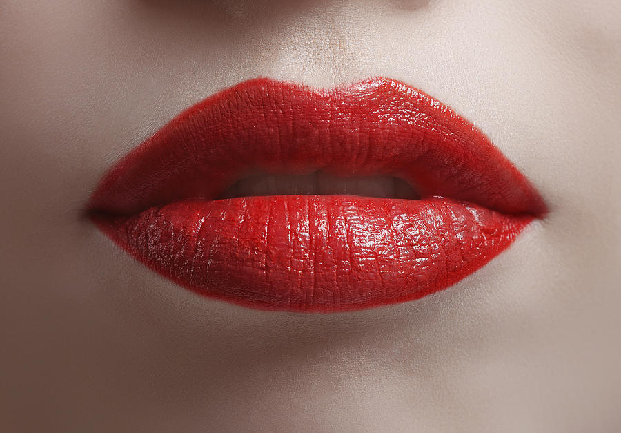 Close up of bright red shiny lips Photograph by Paper Boat Creative