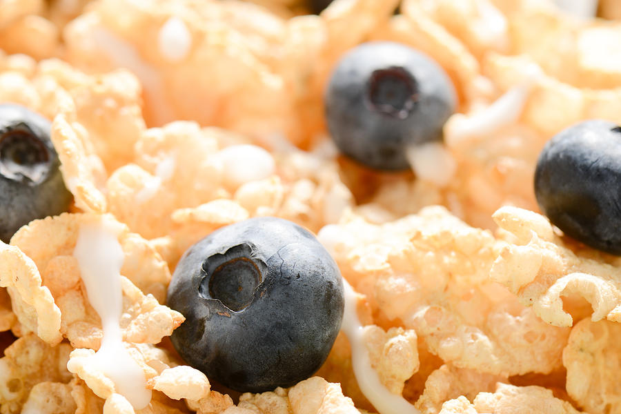 Close Up of Cereal with Blueberries and Milk Photograph by Brandon Bourdages