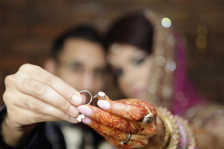 Close-up Of Couple Holding Wedding Photograph by Hassan Khalifa / Eyeem