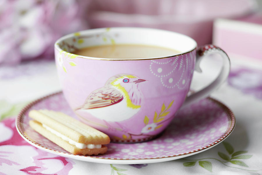 Close Up Of Cup Of Tea And Cookie Photograph by Debby Lewis-harrison