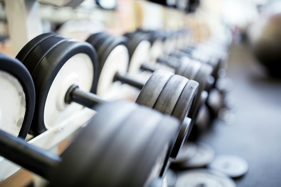 Close-up Of Dumbbells In Row Photograph by Science Photo Library
