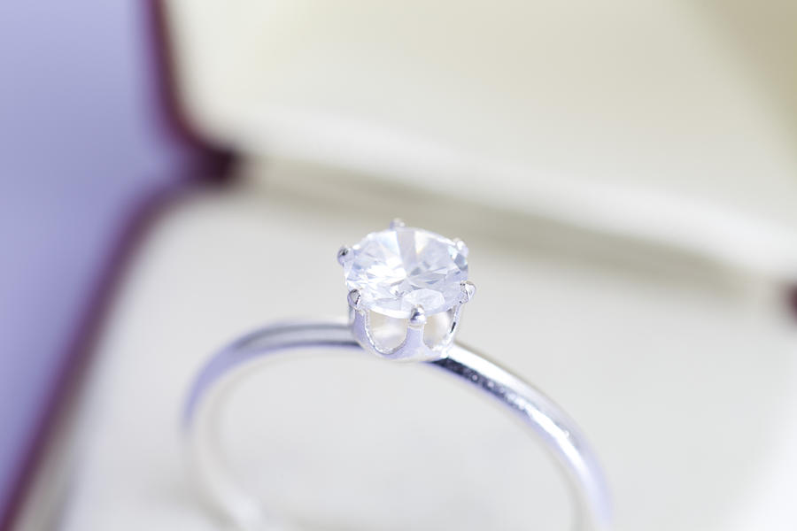 Close up of engagement ring in a ring box Photograph by JamieB