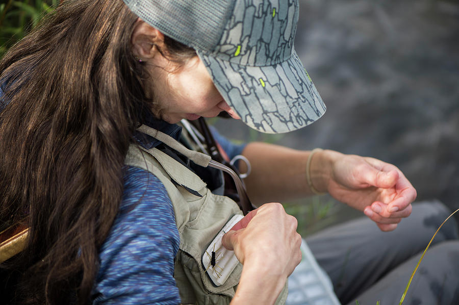 Fly Fishing Photograph - Close-up Of Female Angler Checking by Jennifer Magnuson