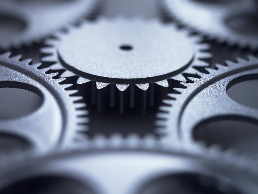 Close up of metal cogs Photograph by Adam Gault