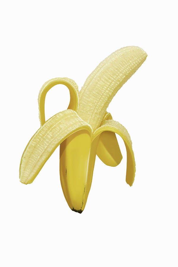 Close Up Of Peeled Banana Photograph by Ikon Ikon Images