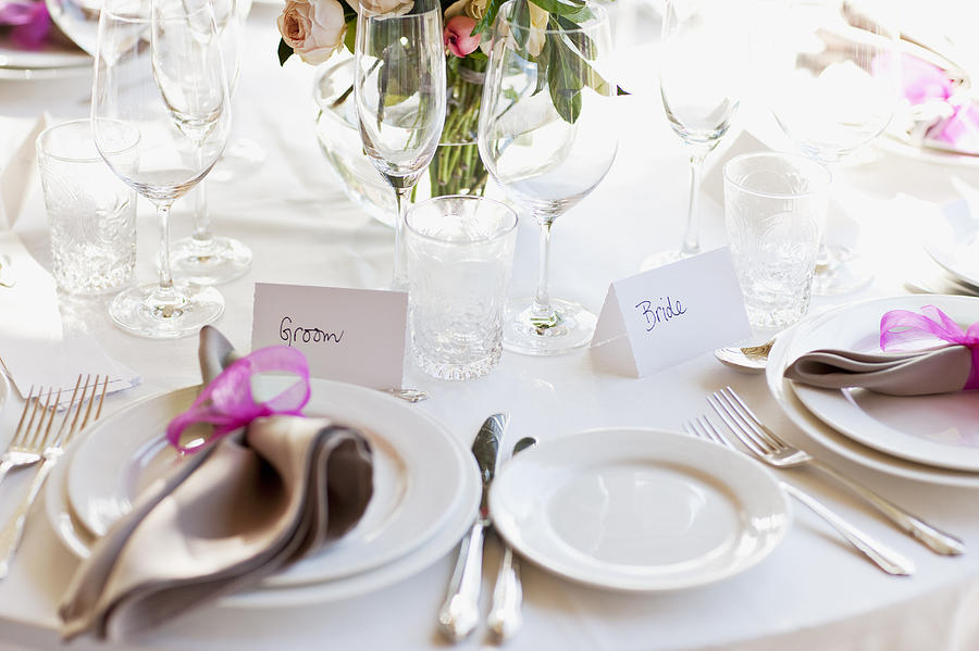 Close up of place setting at wedding reception Photograph by Tom Merton