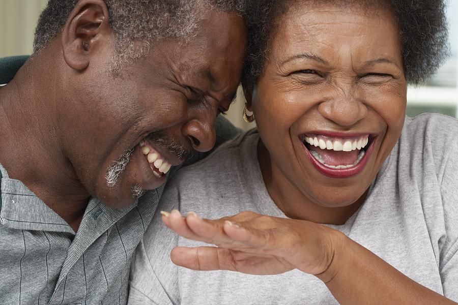 Close up of senior African American couple laughing Photograph by Blend Images - Rolf Bruderer