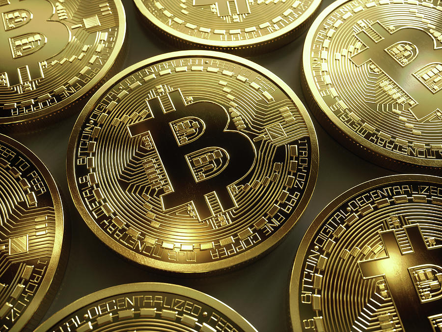 Close Up Of Shiny New Gold Bitcoins Photograph by Ikon Ikon Images