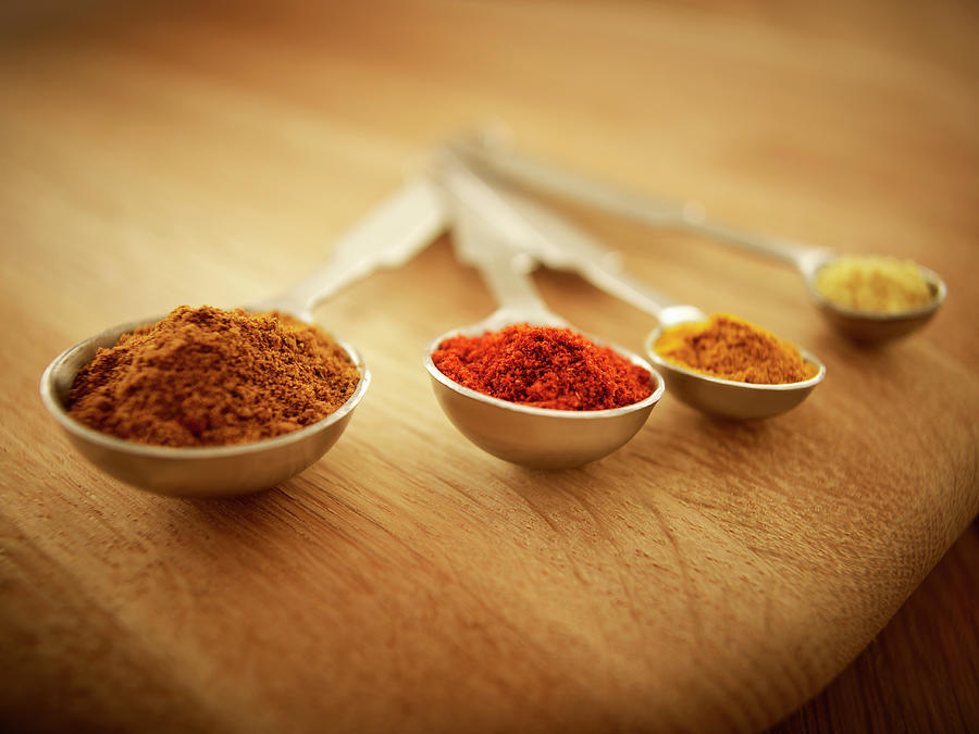 Close Up Of Spices In Measuring Spoons Photograph by Adam Gault