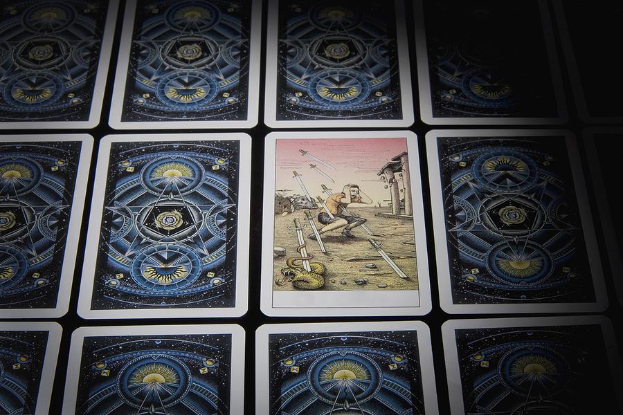 Close-up of tarot cards in a row Photograph by Glowimages