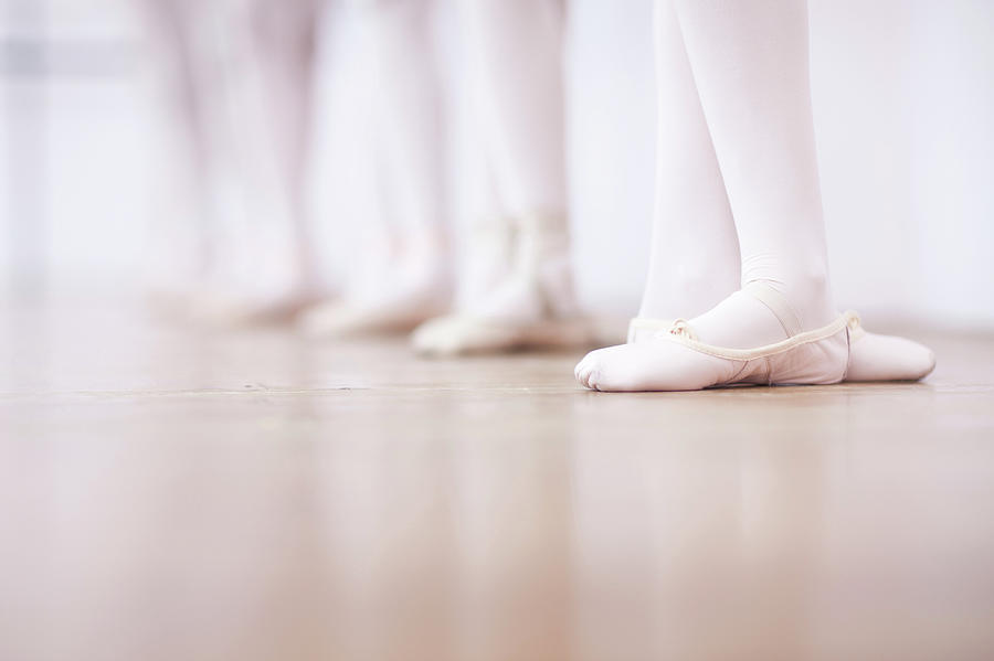 Close Up Of Teenage Ballerinas Feet Photograph by Zero Creatives