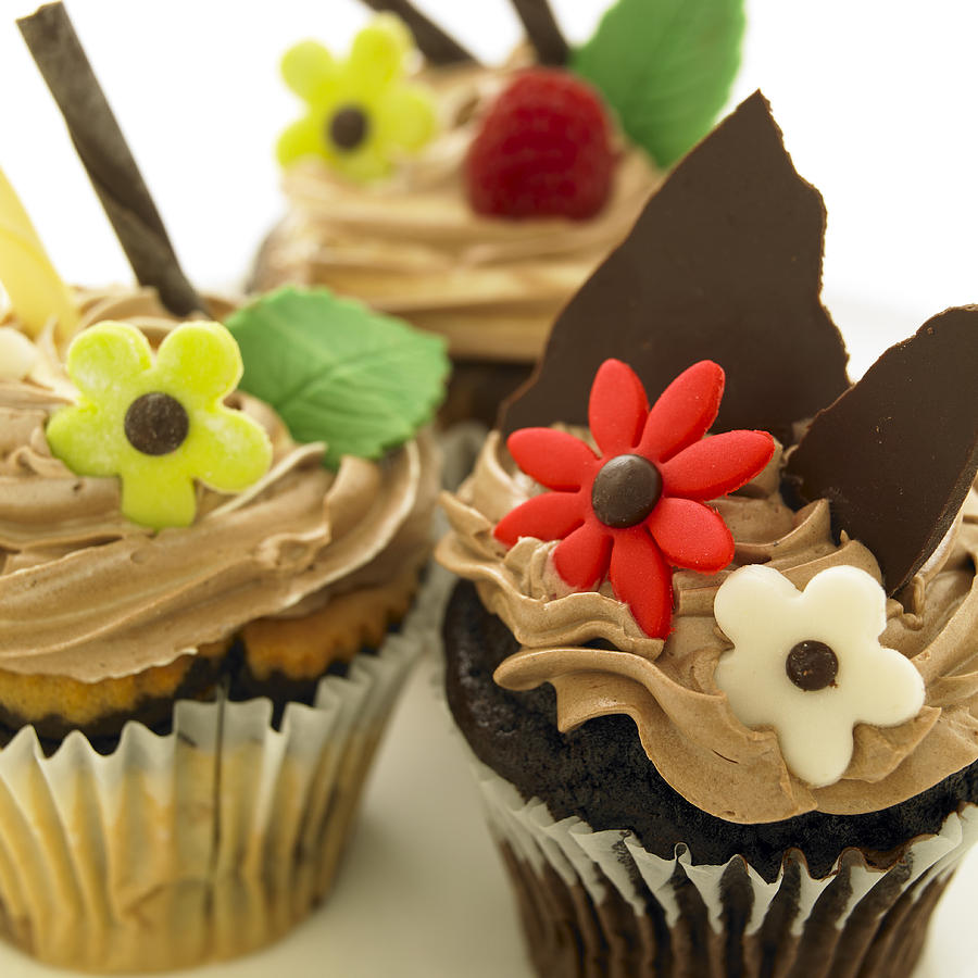 Candy Photograph - Close-up Of Three Chocolate Cupcakes by Works Photography
