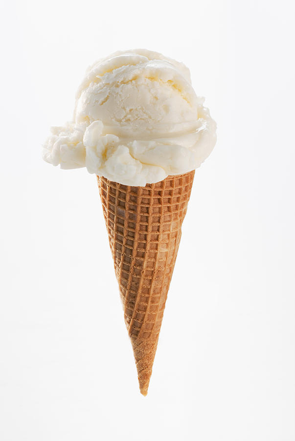 Close up of vanilla ice cream cone Photograph by Tetra Images