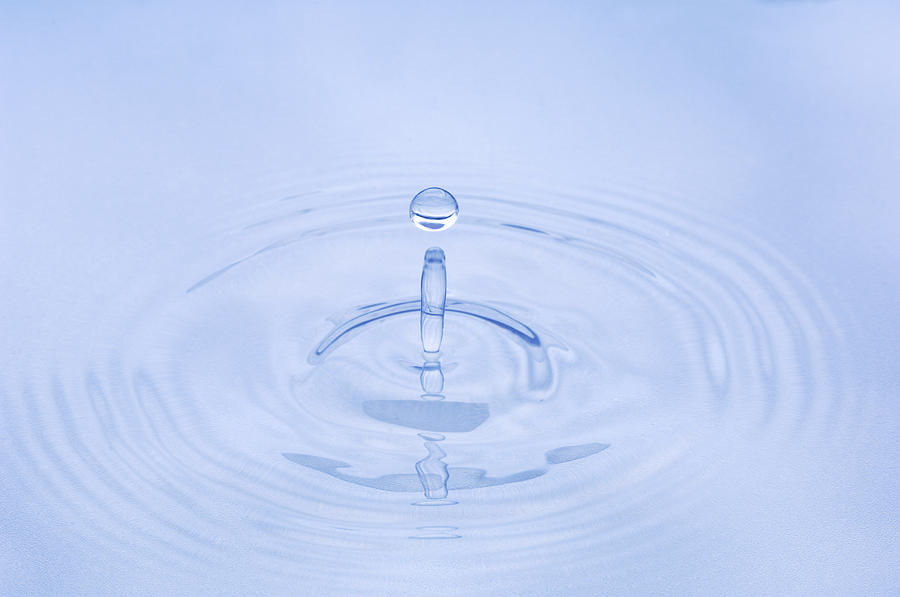 Close Up Of Water Droplet Hitting The Photograph