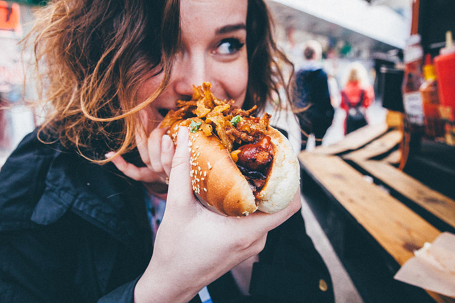 Close-up Of Young Woman Eating Hot Dog On Street Photograph by Katarína Mittáková / EyeEm Close-up Of Young Woman Eating Hot Dog On Street Photograph by Katarína Mittáková / EyeEm