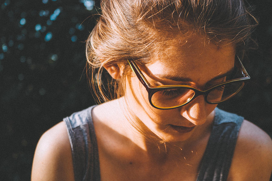 Close-Up Of Young Woman In Eyeglasses Photograph by Vinicius Rafael / EyeEm