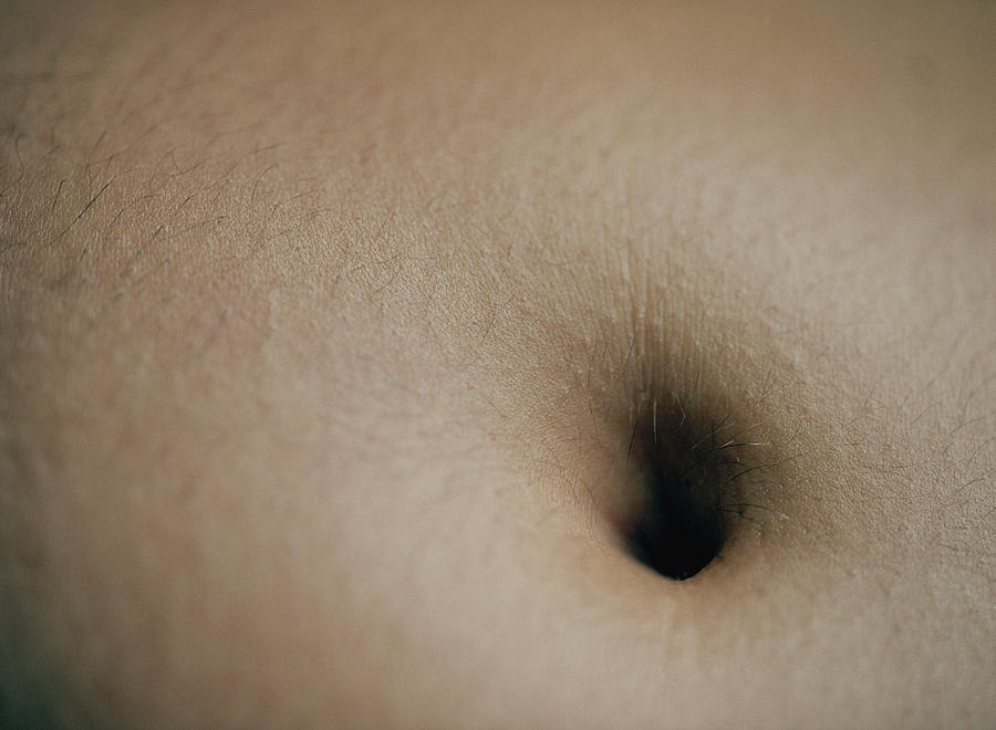 Close-up of young womans navel Photograph by Veronique Beranger