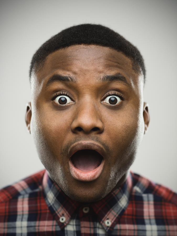 Close-up portrait of shocked man Photograph by SensorSpot