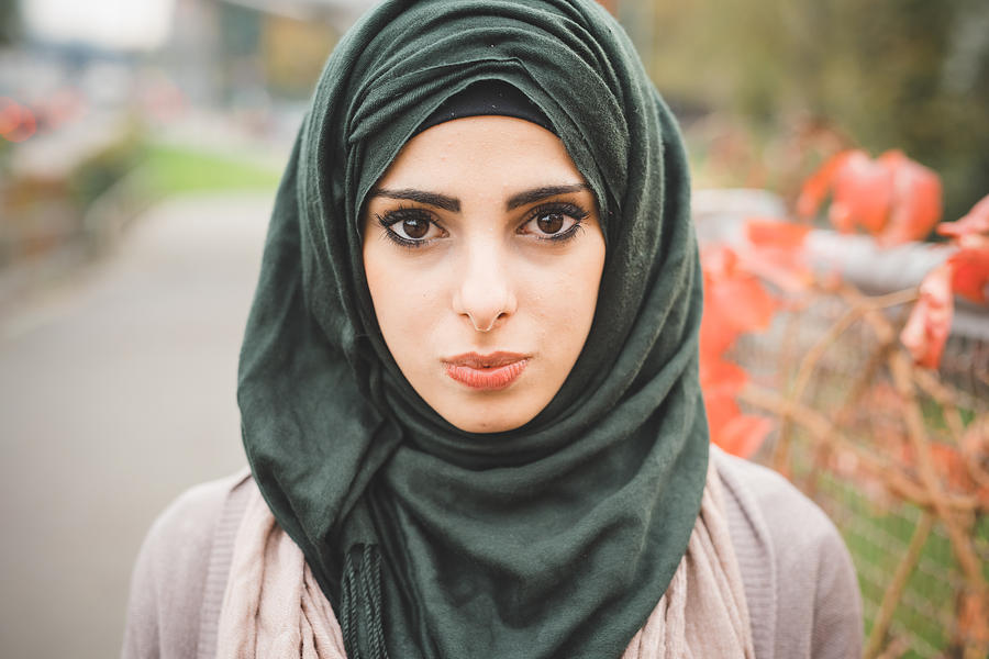 Close up portrait of young woman wearing hijab Photograph by Eugenio Marongiu
