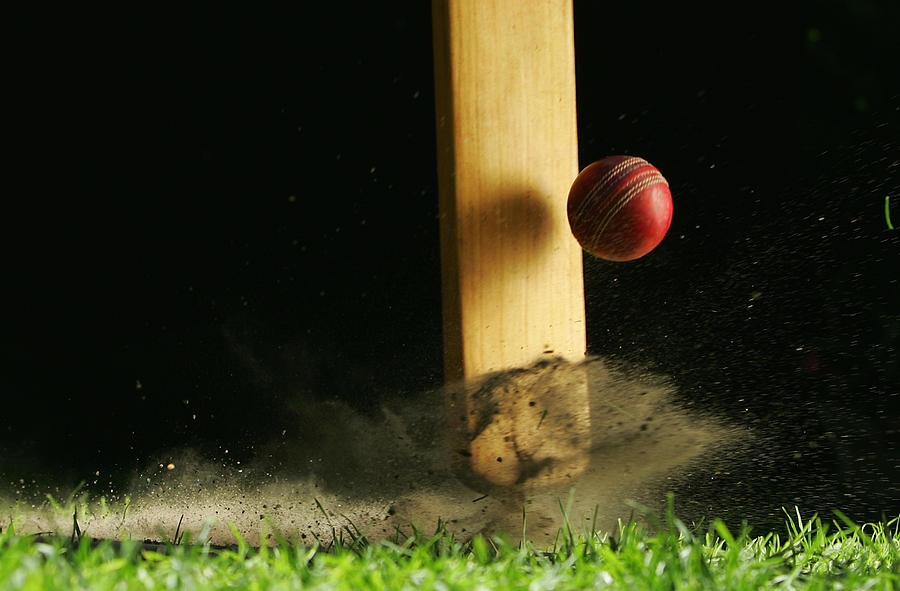 Close-up shot of cricket bat hitting ball Photograph by Kolbz