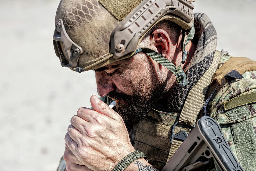 Close-up Shot Of Soldier Smoking Photograph by Oleg Zabielin