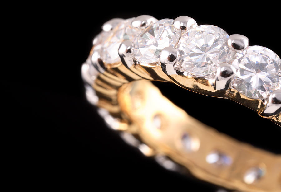 Close up view of gold ring with diamonds Photograph by ProArtWork