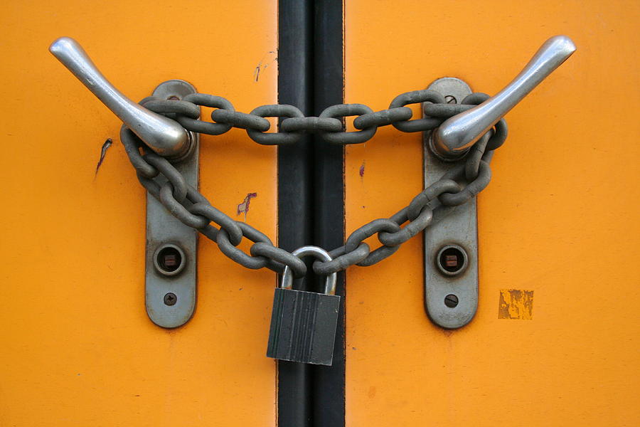 Closed plus locked with chain and padlock Photograph by Pejft