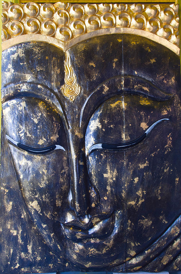 Buddha Photograph - closed up face Buddha statues  by Nittaya Mungma