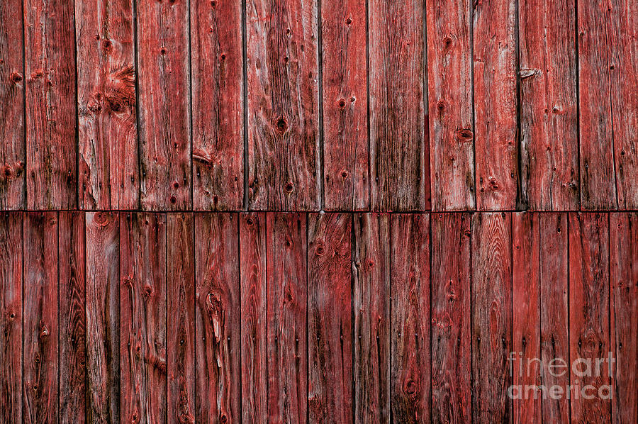 Closeup of a weathered red barn. Photograph by Don Landwehrle