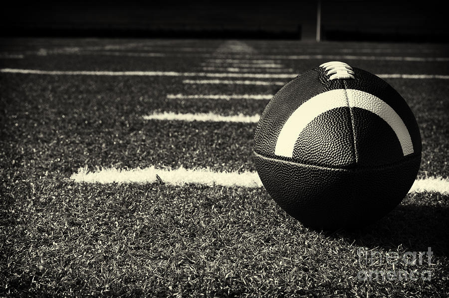 Closeup of American Football on Field Photograph by Danny Hooks