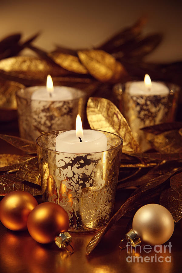 Closeup of candles lit with a sparkling gold theme Photograph by Sandra Cunningham