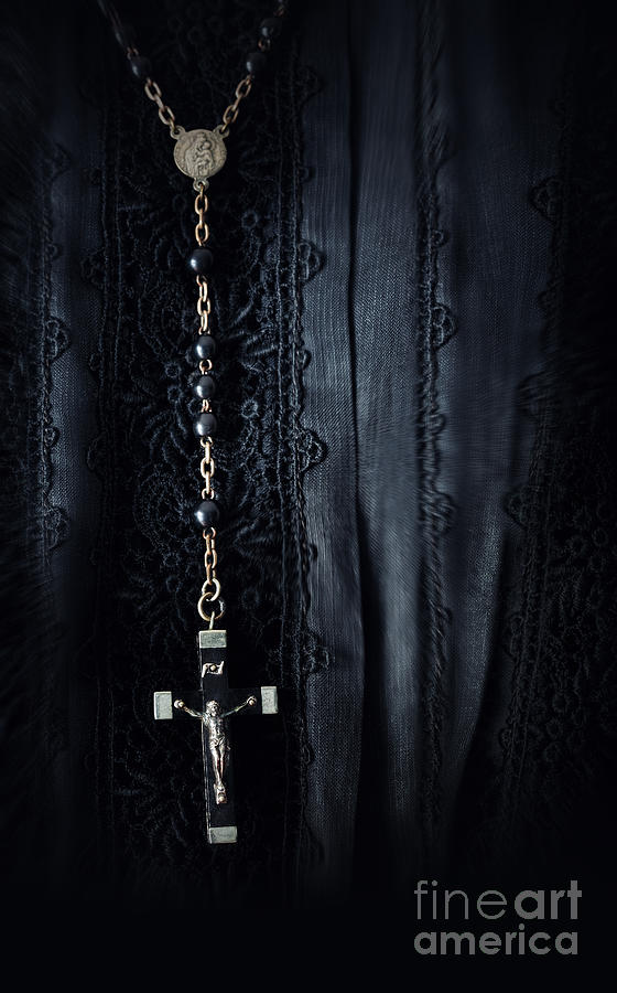 Closeup of prayer beads against black morning dress Photograph by Sandra Cunningham
