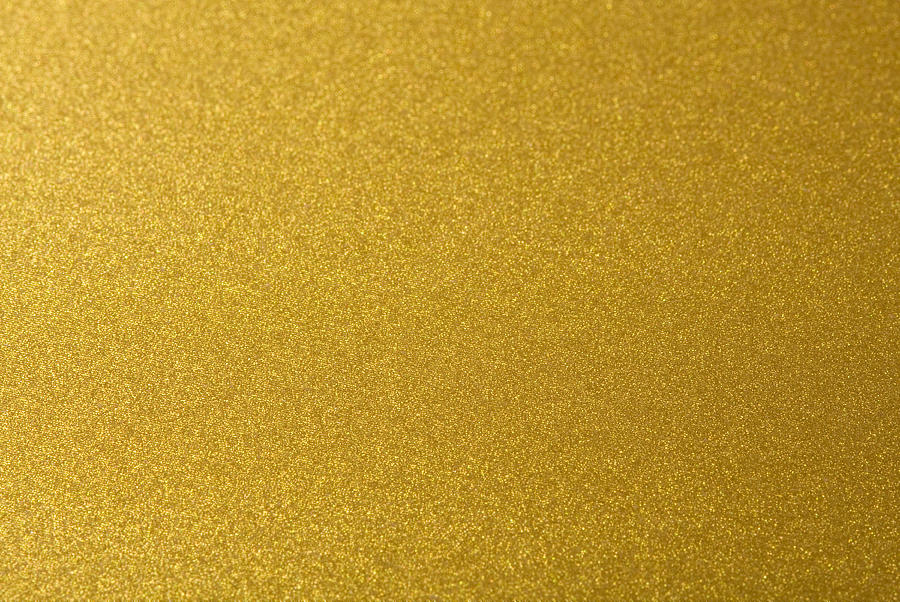 Closeup shot of abstract golden background. Photograph by DirkRietschel